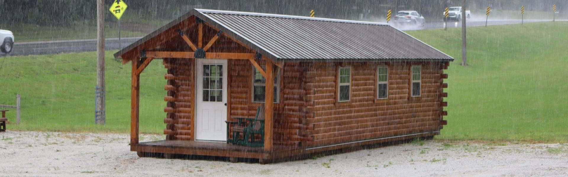Homestead Sales portable cabin in the rain